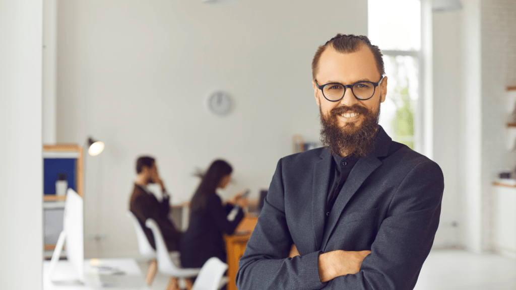 Happy businessman standing