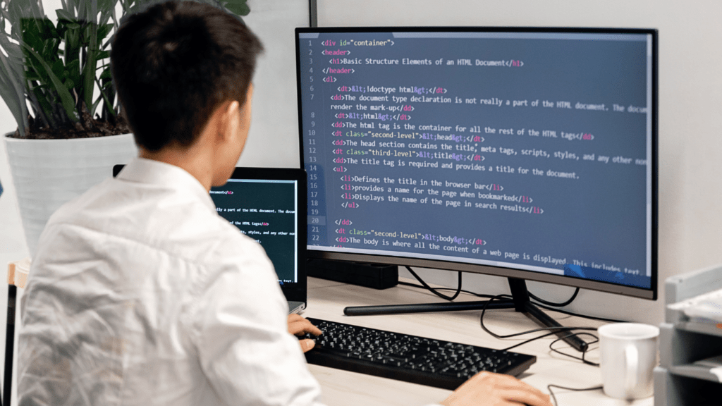 a person is working on a computer screen