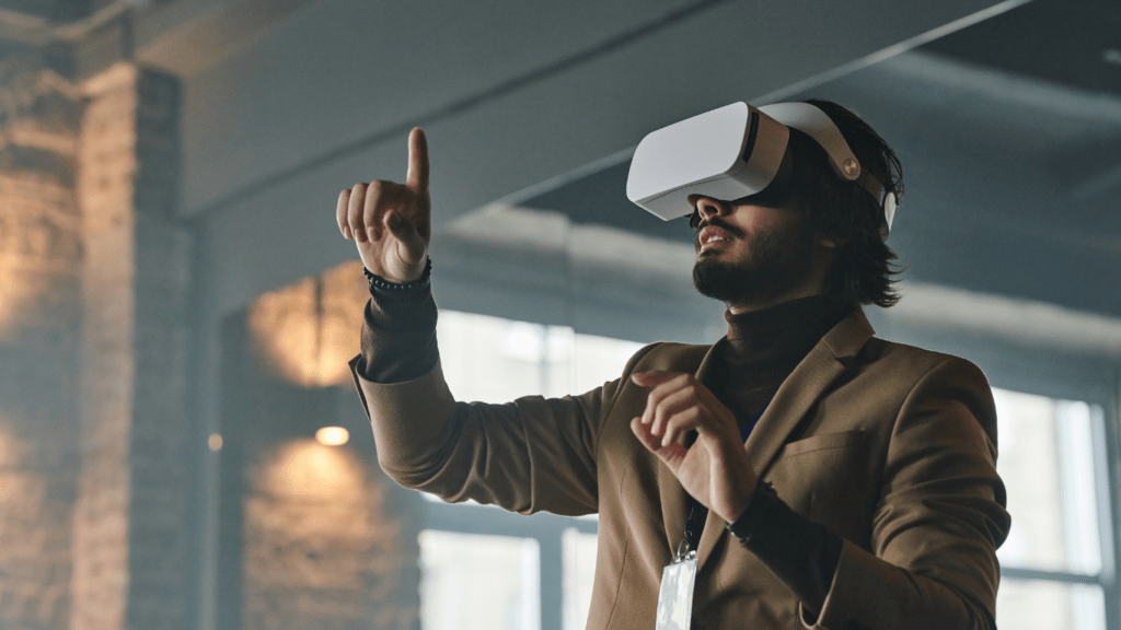 a person wearing a black leather jacket and holding a vr headset